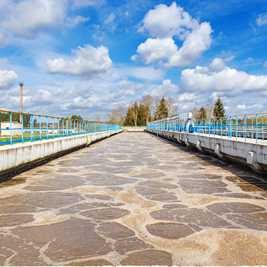 Aeration basins aid in reducing organics that enter the treatment plant from influent waters. Biodegradable organic matter is converted into carbon dioxide and water